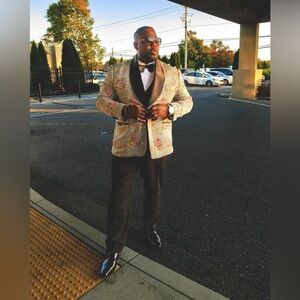 To fresh Suite jacket, tuxedo pants, satin vest, satin cumberbund.